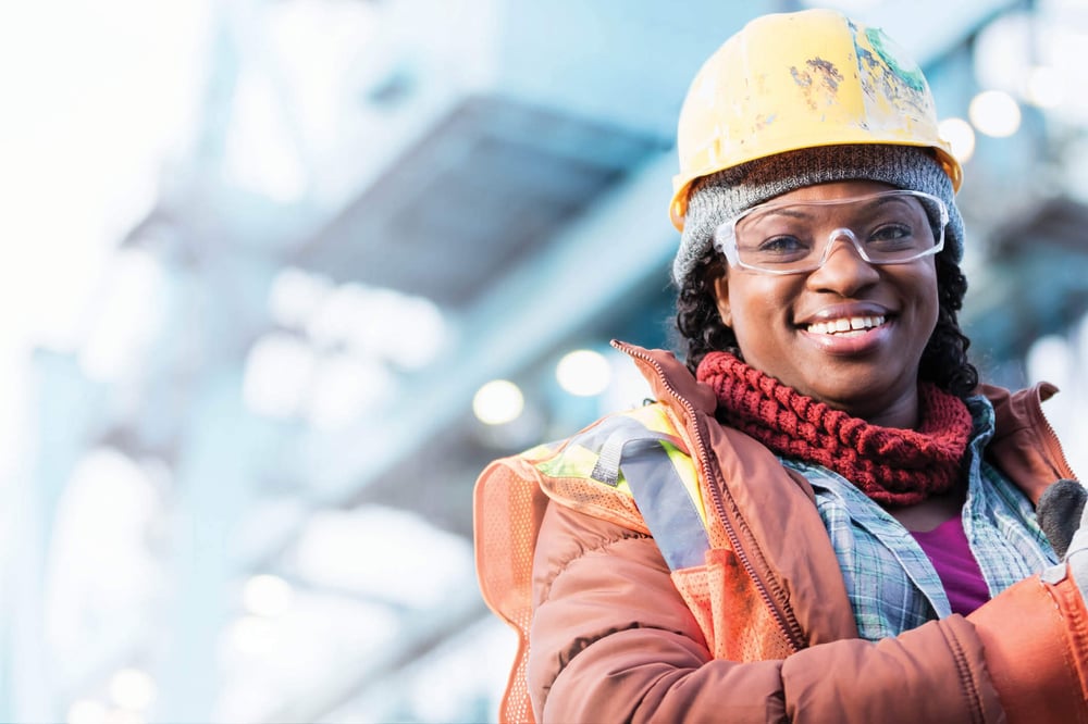Safety woman in safety gear